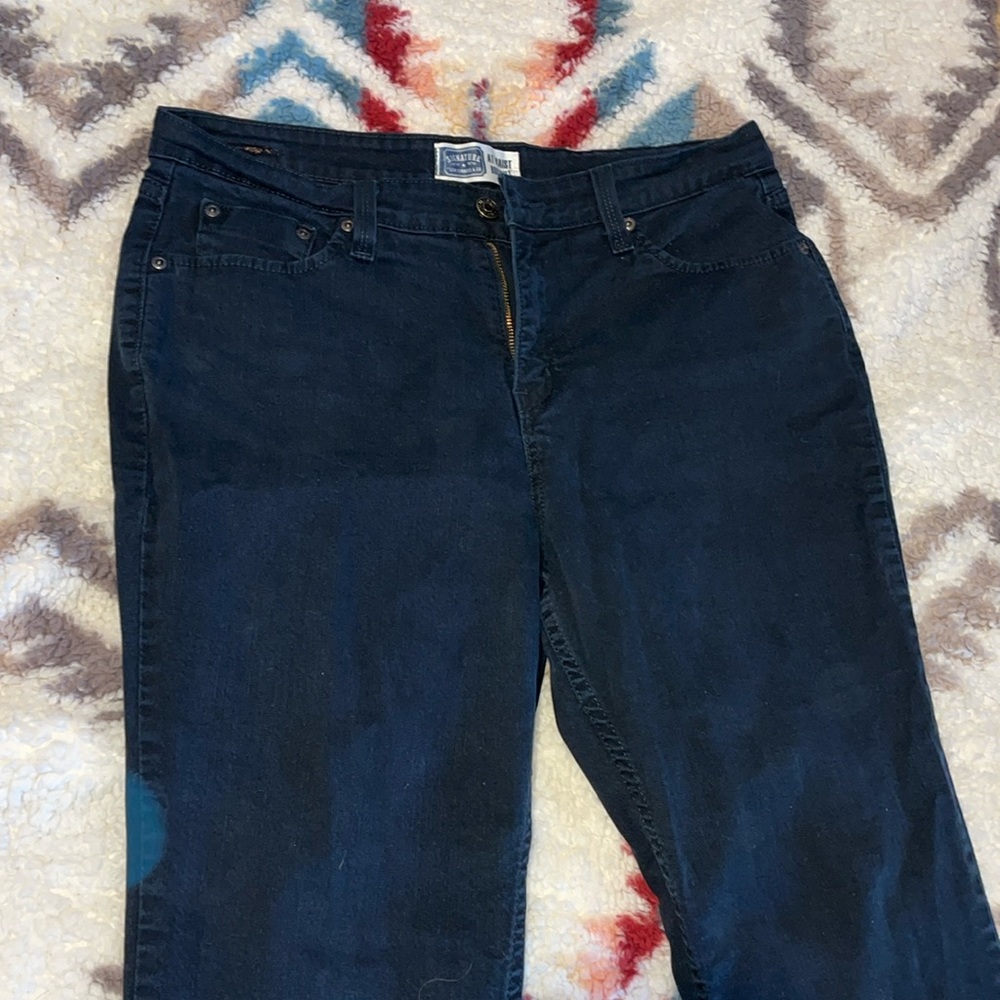 No tags they are too big for me. black boot cut pair of women’s jeans